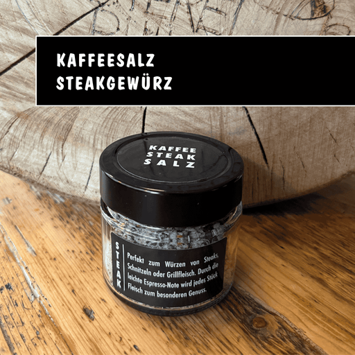 Glas mit Kaffee Steak Salz Gewürz aus der Kaffeerösterei Nidda auf Holzuntergrund.