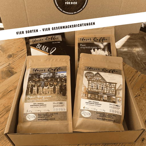 Kräftiges Kaffee Probierpaket der Privatrösterei Philipp mit verschiedenen Kaffeepackungen in einer Geschenkbox